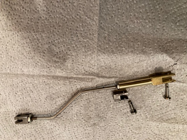 Lubricator linkage